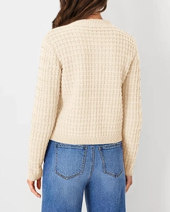Rear view of beige waffle knit cardigan showing detailed texture and high-quality fabric