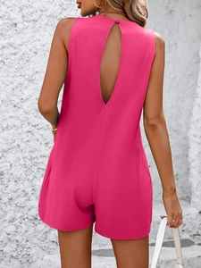Detailed back view of a fuchsia backless romper featuring a halter neck and cutout design