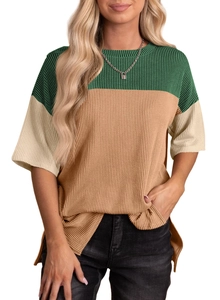 Close-up of color-block patchwork t-shirt with ribbed knit texture and side slit detail