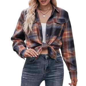 Women's oversize plaid flannel shirt with double chest pockets and classic button-down front