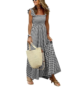Close-up of black and white gingham smocked bodice with ruffled shoulder straps