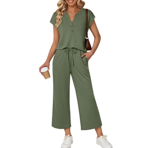Women's olive green two-piece casual set with short sleeve V-neck top and wide-leg pants