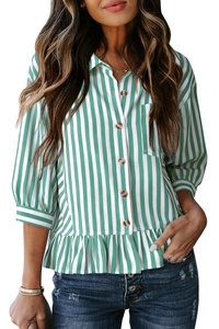Detail of green and white striped shirt with wood buttons and ruffled hemline