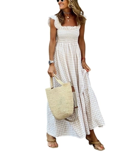 Detail of smocked bodice and tiered hem on this beige gingham check summer maxi dress