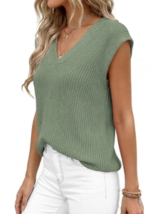 Detailed close-up of sage green V-neck knitted vest showing chunky textured knit pattern