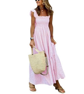 Detail of pink gingham summer dress featuring smocked bodice and square neckline