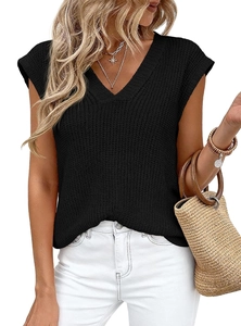 Detail of black V-neck chunky knit vest showing texture and sleeveless shoulder design