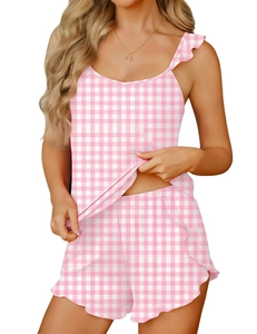 Detail of pink and white gingham pajama set featuring ruffled straps and hems