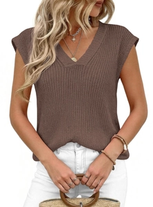 Close-up of brown V-neck sleeveless knit vest with thick texture and ribbed hem detail