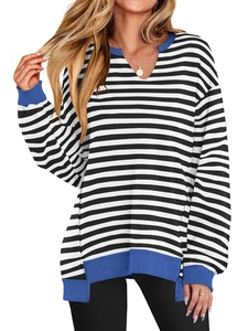 Detail showing classic black and white horizontal stripes with dark blue ribbed neckline trim