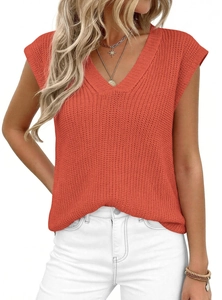 Detail of coral orange V-neck knit sweater vest featuring chunky knit texture for women