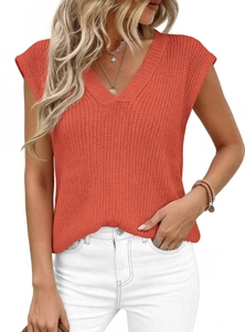 Detail of the V-neckline and textured knit fabric on this orange sleeveless summer sweater