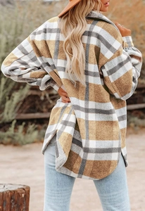 Detail of a loose-fitting plaid flannel shirt jacket with side slit and back view design