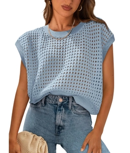 Detailed close-up of light blue hollow-out knit texture on women summer sleeveless top