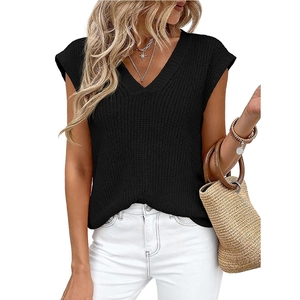 Women's black V-neck chunky knit vest top featuring thick texture and a sleeveless design