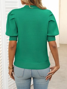 Back view of a green knit top featuring stylish puff sleeves and a sleek crew neck design