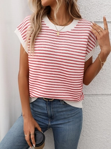 Close-up of red and white striped knit fabric texture on a short sleeve crewneck top