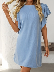 Detailed texture of blue and white striped fabric with flutter sleeves on a casual dress