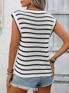 Detail showing the classic black and white striped knit texture on the back of the vest