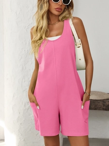 Relaxed fit pink sleeveless romper for women featuring large side pockets and crew neck