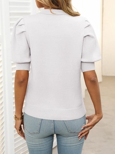 Back view of a light gray knit top featuring stylish puff sleeves and a casual crew neck