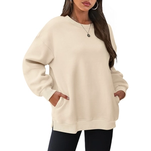 Oversized beige crewneck sweatshirt with front pockets and ribbed cuffs for women