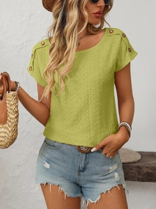 Detail of lime green short sleeve top with geometric eyelet texture and shoulder buttons