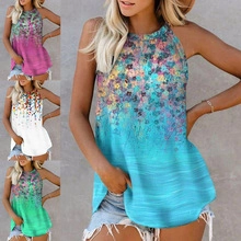 Detail view of various floral print sleeveless tanks with bohemian style patterns