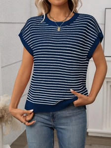 Detail of blue and white striped knit top showing the round neck and ribbed trim texture