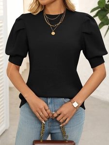 Detail of black puff sleeve knit top with textured fabric and classic crew neck design