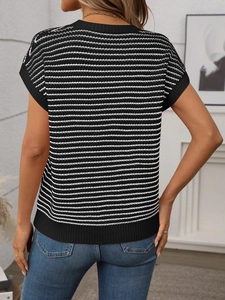 Rear view of a casual black and white striped short sleeve knit top with ribbed hem