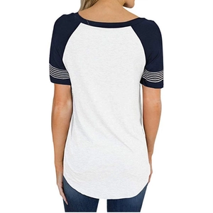 Detail of raglan sleeves with white stripes on a grey and navy blue casual t-shirt