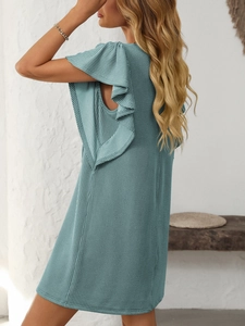Detail of teal tiered ruffle sleeves and textured ribbed fabric on a midi dress