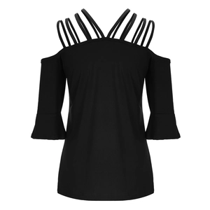 Detail of off-shoulder black top featuring multiple thin straps and flared bell sleeves
