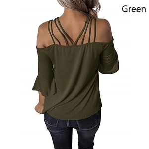 Rear view of off-shoulder dark green top featuring strappy back and flare sleeves