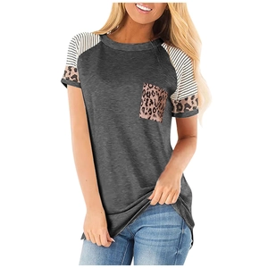 Detail of leopard print pocket and striped sleeve design on a dark grey casual t-shirt