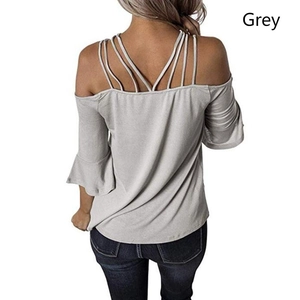Back view of grey off-shoulder top with thin crisscross straps and flared bell sleeves