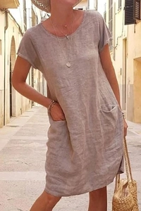 Taupe loose linen dress with short sleeves and front pockets for a summer casual look
