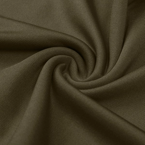 Macro shot of dark olive green ribbed knit fabric with soft silk-like sheen and texture