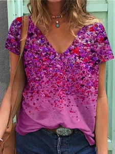Close-up of V-neck floral summer T-shirt featuring purple gradient and casual loose fit