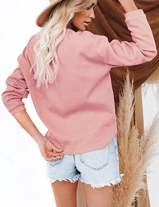 Detailed back view of the pink ribbed V-neck long sleeve top with soft knitted texture