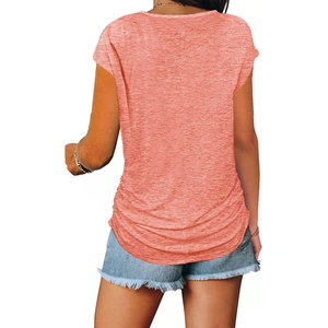 Back view of a coral orange short-sleeve T-shirt with denim shorts on a clean white background