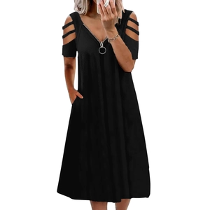 Detail of a black V-neck summer dress with silver zipper and cold shoulder hollow sleeves