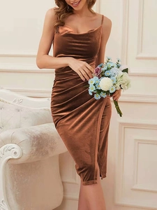 Detail of cowl neck and side ruched slit on a brown velvet cocktail dress