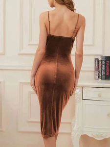 Detailed back view of a dark brown velvet slip dress with slim fit and elegant draping