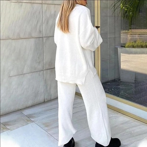 Women's white knitted V-neck loungewear set with cozy sweater and wide-leg pants