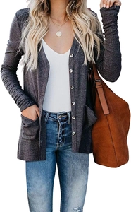 Detail of ribbed knit texture and button closure on dark grey women cardigan