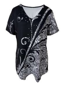 Detailed view of women's 3XL V-neck T-shirt with asymmetric geometric and floral patterns
