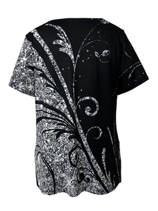 Detailed view of women's black T-shirt featuring abstract floral and vine geometric print