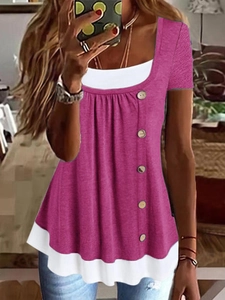 Detail of summer short sleeve top with pleated square neck and decorative buttons